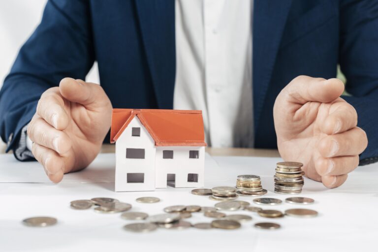 الرئيسية close up hands with coins house